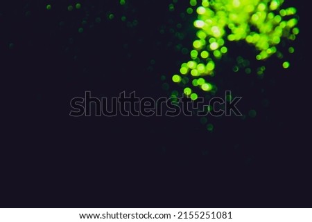 Abstract green bokeh luxury with black background
