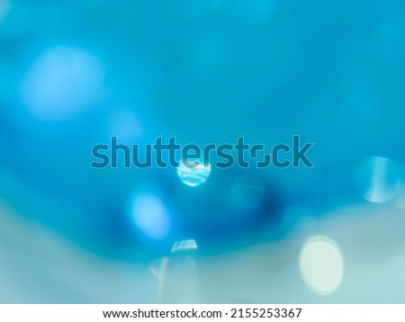 light blue glitter blur for abstract background