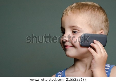 little boy calling his parents