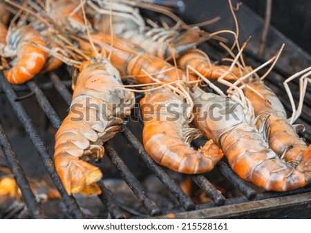 grill freshwater shrimp  on flame picture .