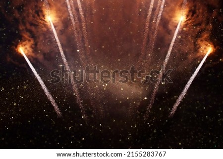 background of abstract gold and black glitter lights with fireworks. defocused