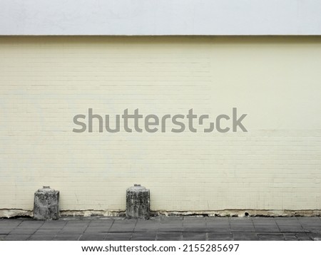 aged street yellow wall background
