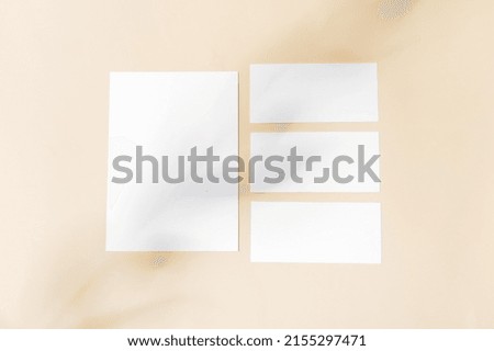 Many blank paper sheets on color background