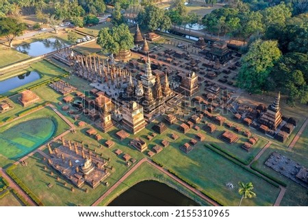 Aerial view of Wat Mahathat buddha and temple in Sukhothai Historical Park Royalty-Free Stock Photo #2155310965