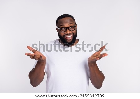 Photo of cute charming guy dressed casual t-shirt eyeglasses telling speaking you isolated white color background