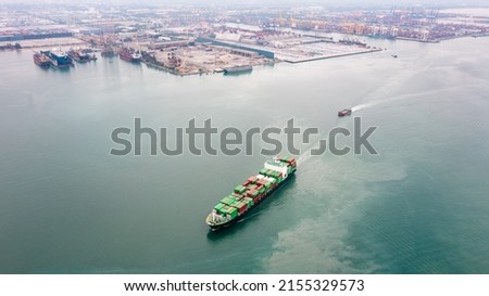 Container ship transporting cargo logistic import and export goods internationally around the world, including Asia Pacific and Europe, Aerial view photograp from drone 