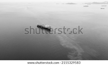 black and white Container ship sailing in deep sea for transporting cargo logistic import and export goods internationally around the world, including Asia Pacific and Europe, business and industry