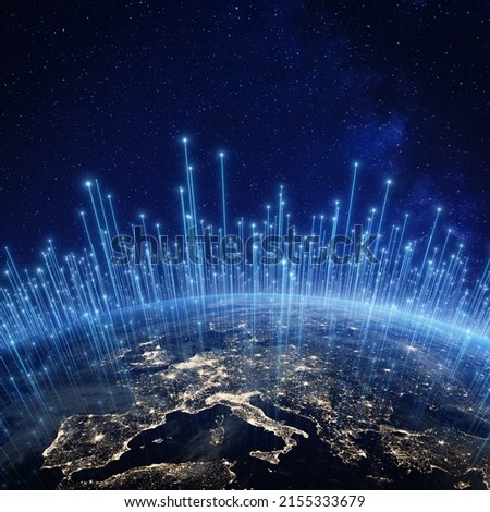 Global communication network above Europe viewed from space. Internet cellular connection and satellite telecommunication technology around the world. Elements from NASA. Royalty-Free Stock Photo #2155333679