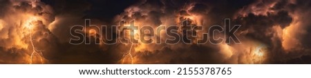 Panorama Dark cloud at  night with thunder bolt. Heavy storm bringing thunder, lightnings and rain in summer. Royalty-Free Stock Photo #2155378765