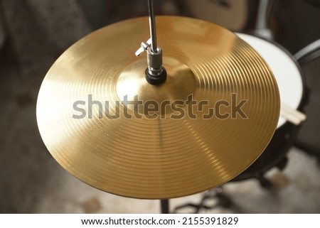 Closeup view of drum cymbal in studio Royalty-Free Stock Photo #2155391829