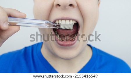 Instructions on how to brush your teeth. Step-by-step scheme.  Clean healthy, healthy lifestyle, white teeth. Photo with arrows showing the correct directions for brushing your teeth.