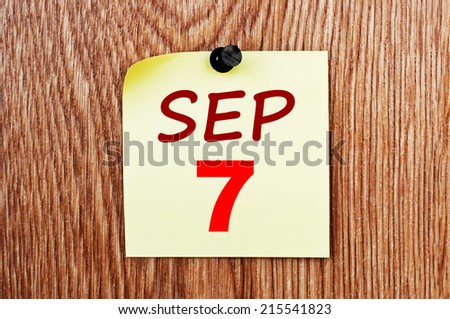 September 7 calendar. Note paper on a message board