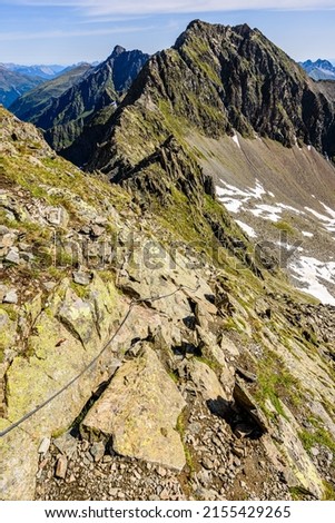 A via ferrata trail leading towards the summit Rinnenspitze in Stubai Alps. 