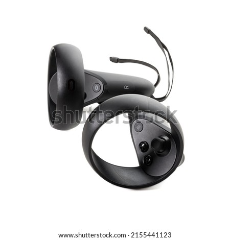 VR joysticks from virtual reality glasses isolated on white background. Left and right controllers of the VR helmet Royalty-Free Stock Photo #2155441123