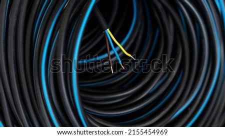 Electrical installation material, wires and cables for an electrical wiring, high prices of building materials, CYKY-3x1,5 Royalty-Free Stock Photo #2155454969