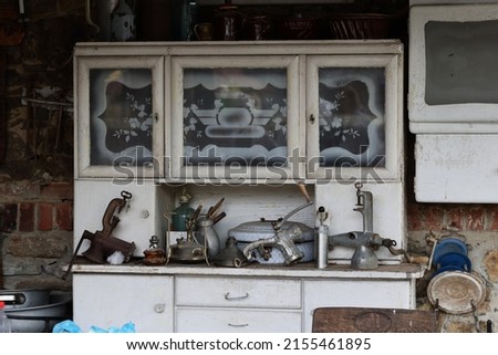 An antique kitchen cupboard under the roof.