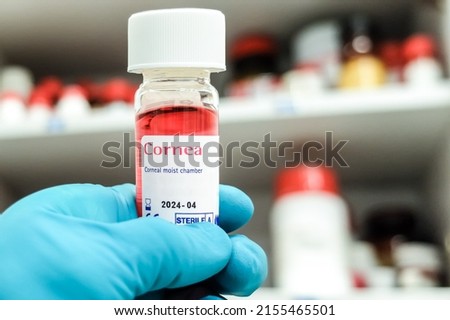 Corneal moist chamber - special container for storage of human corneas. Corneas are collected from recently deceased individuals for transplantation (grafting) purposes. Royalty-Free Stock Photo #2155465501