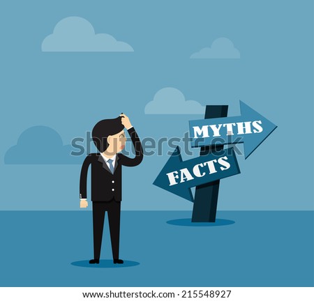 Businessman  and directional sign of facts versus myths Royalty-Free Stock Photo #215548927