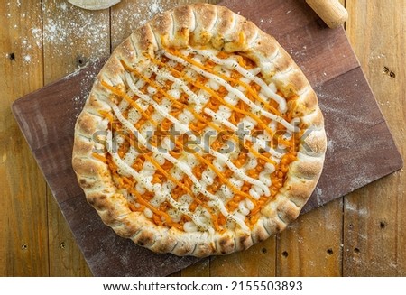 Cheddar and creamy cheese pizza