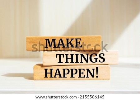 Wooden blocks with words 'Make things happen'. Royalty-Free Stock Photo #2155506145