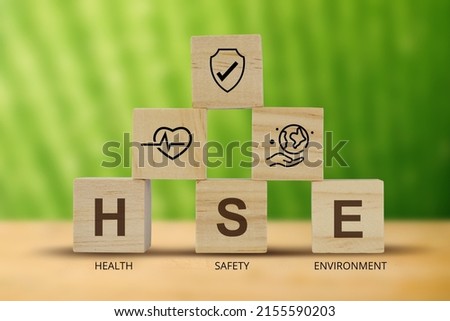 HSE on word letters cube, Health Safety Environment acronym, illustration.