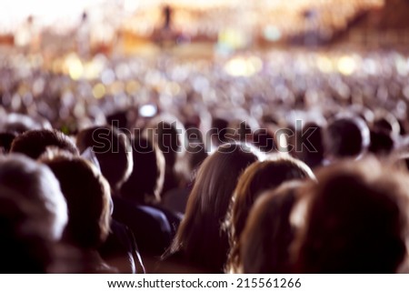 Large crowd of people watching concert or sport event Royalty-Free Stock Photo #215561266