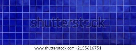 tile floor with bright colored blue abstract mosaic pattern