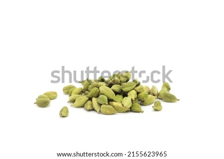 Pile of cardamom or cardamon seeds spice isolated on white background. Royalty-Free Stock Photo #2155623965
