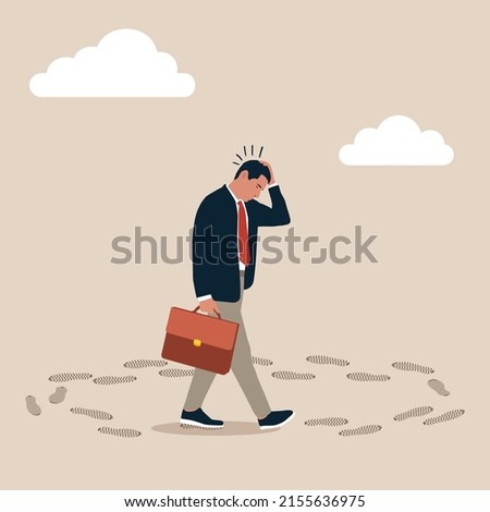 Frustrated businessman walk in circle with no way out and no career path. Career path dead end, work on same old repetitive job, business as usual no motivation or infinity loop routine job concept. Royalty-Free Stock Photo #2155636975