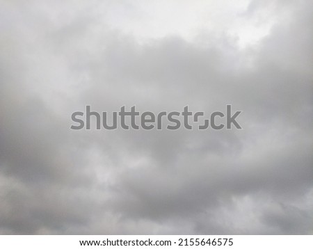 Rainy monsoon clouds visible in the evening sky