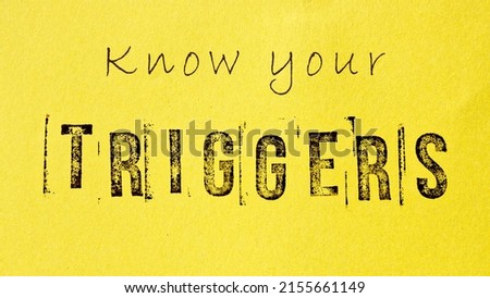 Know your triggers sign message on yellow background. Mental triggering and self-awareness concept. Royalty-Free Stock Photo #2155661149