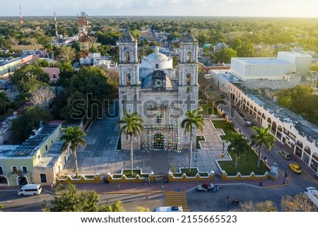 Iglesia De San Servacio Cathedral in Valladolid Mexico down town main city square. symmetrical aerial photo shot, camera zooms in on the cathedral between the towers. Valladolid Mexico  Royalty-Free Stock Photo #2155665523