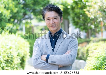 Asian man in a cool jacket