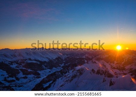Santis peak mountain Switzerland. spectacular view, sunset. winter snow covered mountains . High quality photo