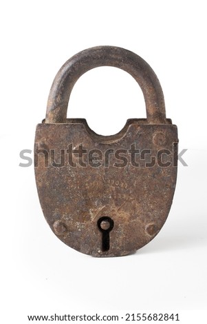 Old rusty metal lock on a white background