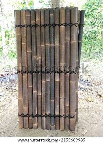 bamboo panels made from a series of bamboo trees are used for room or home decoration