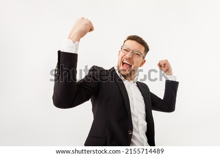 Businessman rejoicing for his success. A jubilant businessman white background.