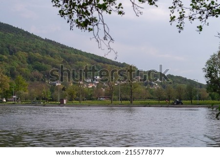river and village on a hill