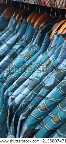 close up picture of blue batik in market 