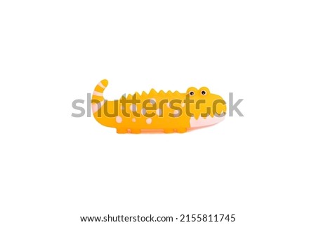 orange rubber crocodile chew toy for dogs