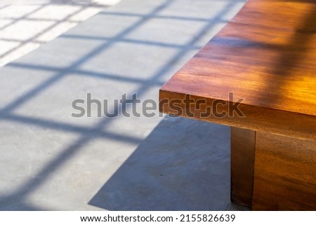 Luxury outside exterior area with wooden table corner and cement concrete floor