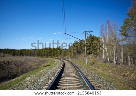 railway with turns near the forest