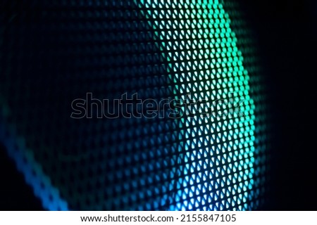 Abstract image of a multi-colored luminous semicircle, illumination on a musical speaker
