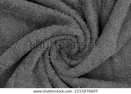 Draped Gray bath Towel texture close up Royalty-Free Stock Photo #2155878609