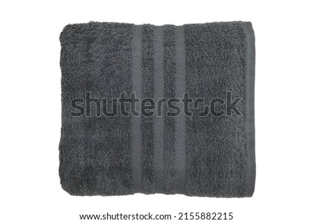 Gray bath towel with arrow fancy isolated top view folded towel on white background Royalty-Free Stock Photo #2155882215