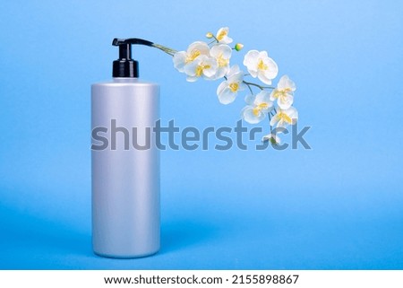 antiseptic from which flowers fly out. Creative idea of ​​disinfection. protection against, COVID-19 coronavirus disease. Nature concept of cleanliness and disinfection by nature
