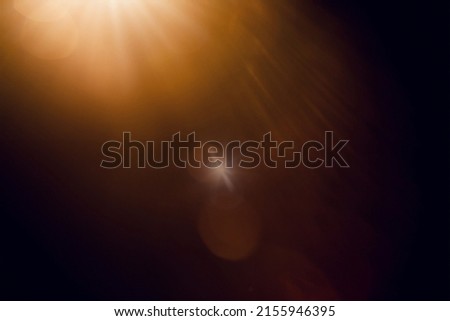 Sun Light Overlay. Sun rays overlay. Sun rays light isolated on black background for overlay design. transparent sunlight special lens flash light effect. front sun lens flash. light of radiance. Royalty-Free Stock Photo #2155946395
