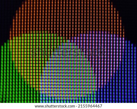 Macro shot of screen pixels in RGB multicolor. Display pixels