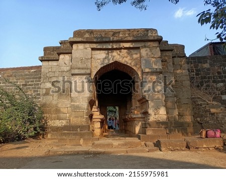Stock photo of Ancient Hindu temple Kopeshwar Mahadev Mandir Entrance door, Beautiful intricate stone carving around the entrance door of the temple.Picture captured under bright sunlight at Khidrapur