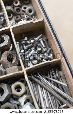 tapping screws made od steel, metal screw, iron screw, chrome screw, screws as a background, wood screw,  Royalty-Free Stock Photo #2155978713